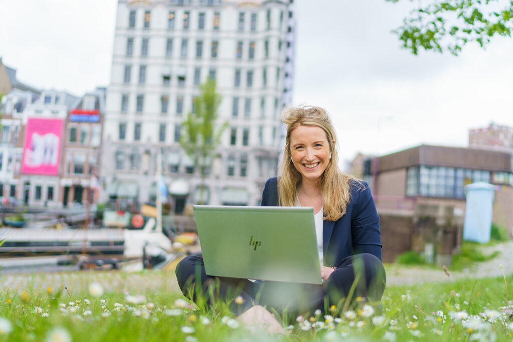 woman outside with laptop